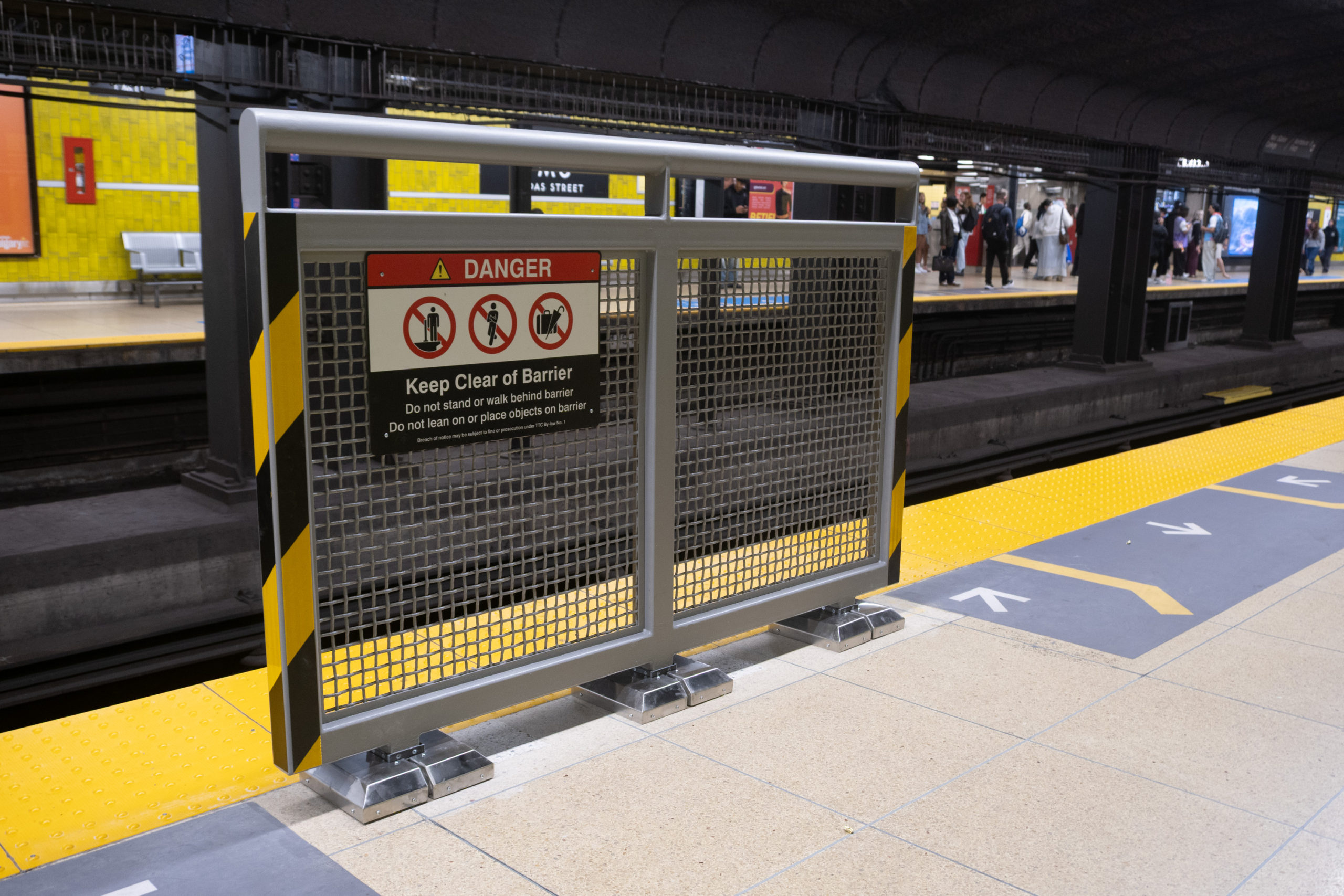Installation of controversial fence-style platform barriers underway at TMU Station