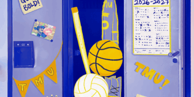 Various sporting equipment in an opened locker