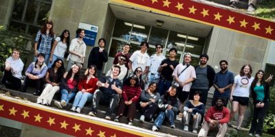 Photo of the Eng Play cast and crew, with boarders of stars.