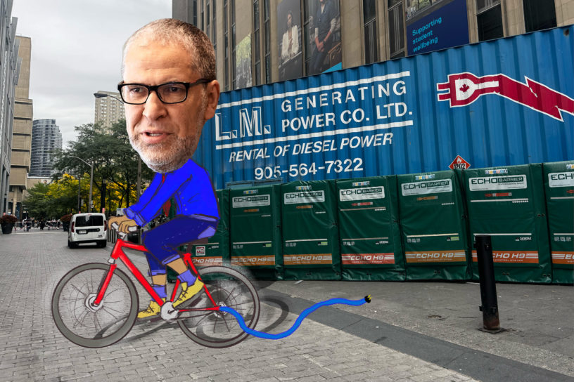A photo illustration of President Mohamed Lachemi on a bicycle, supposedly powering the generators outside of the Victoria Building, however, the cord is not plugged in.